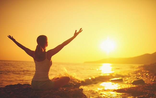 girl doing yoga in morning 