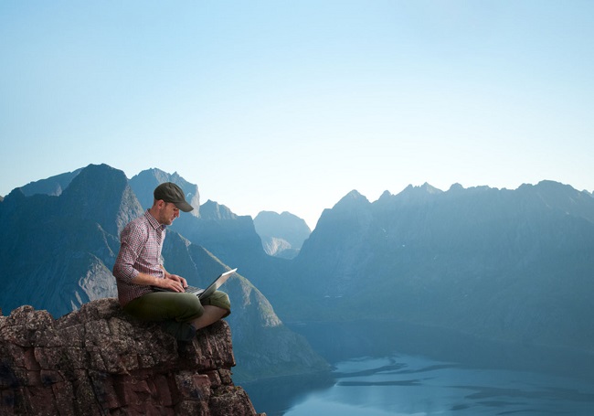 man working on lappy