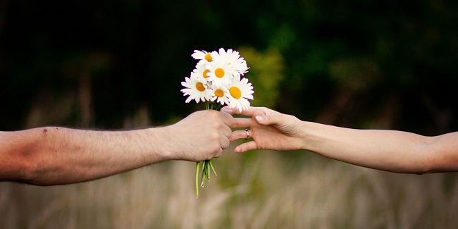 offering flower to your partner