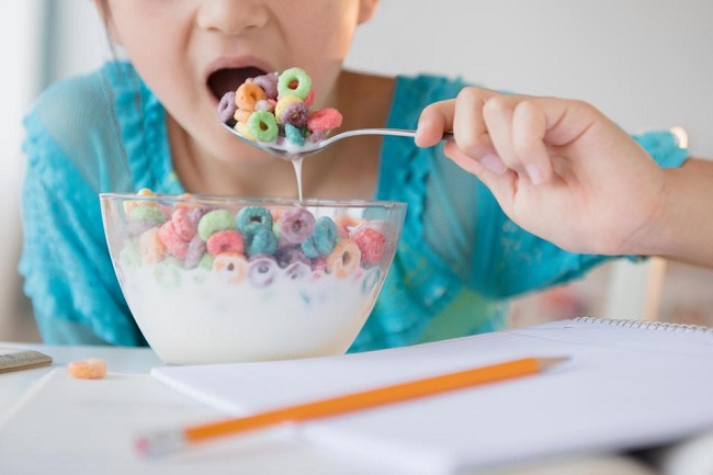 kid eating sugary dessert