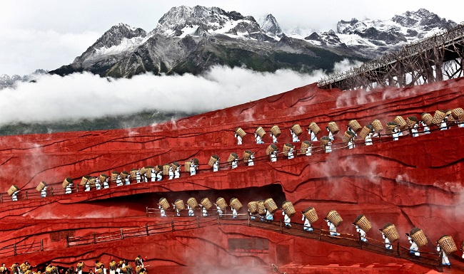 Mine workers climbing a mountain in Yunnan China