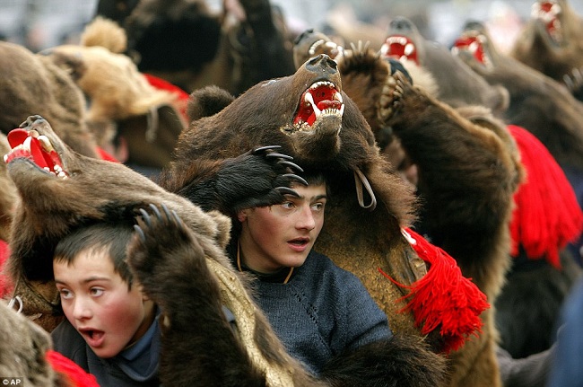 people dance in bearskins