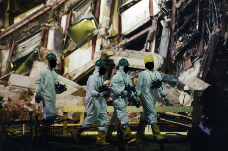 workers removing hazardous material