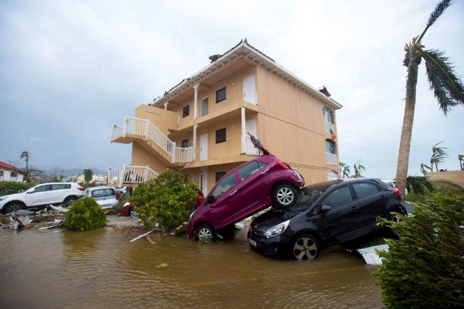 Windswept cars piled Hurricane IRMA