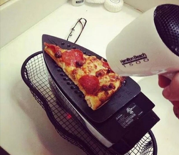 cooking pizza on iron.jpg