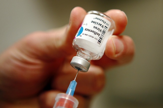 influenza vaccine causes miscarriages