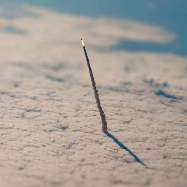 NASA space shuttle leaving the atmosphere