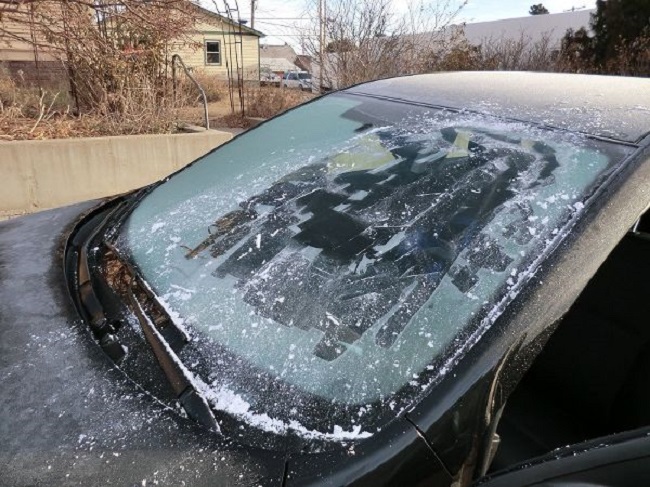 Never try to defrost the windshield with hot water