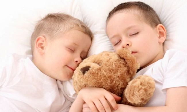 kids sleeping together