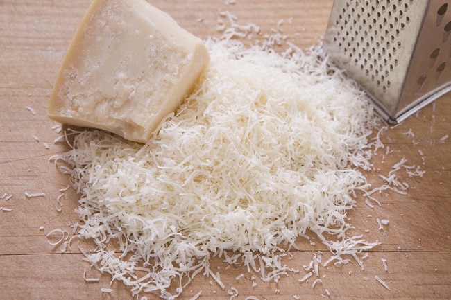 Grating soft cheese without making a mess