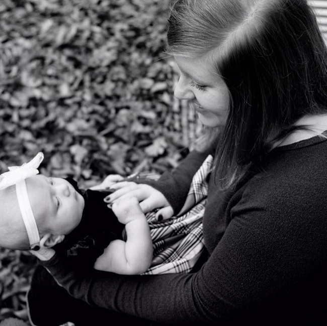 mother playing with the baby