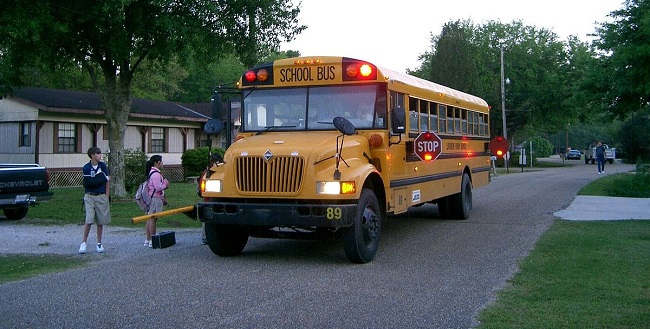 School buses have two flashing stop lights