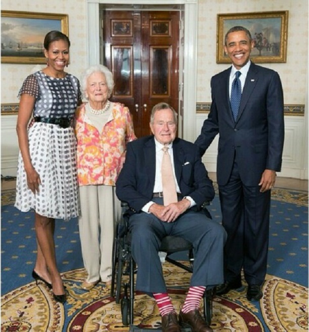 Barack and Michelle Obama with Bush family 