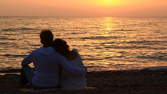 couple looking at sunset