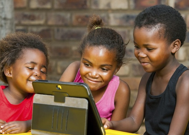 kids using tab in africa