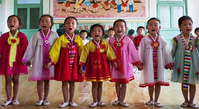 North Korean Children sing for tourists 