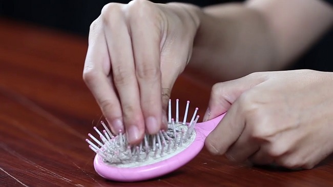 Not washing your comb or brush