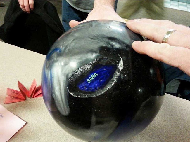 bowling ball inside another bowling ball