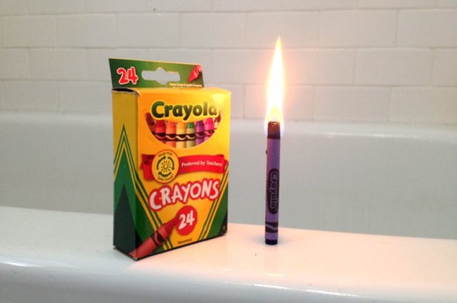 Burning crayons like candles