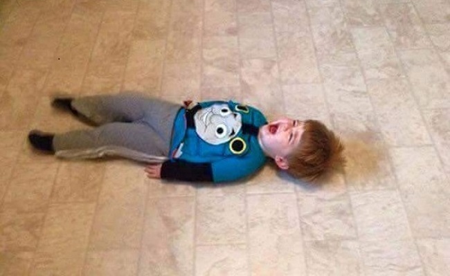 Crying baby on the floor