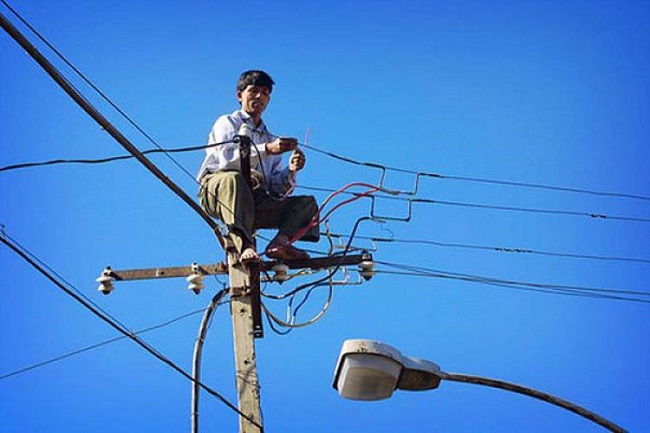 Electrician on the pole