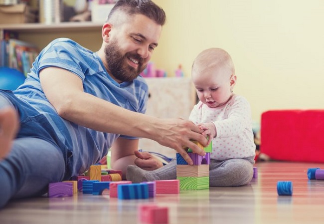 father playing with kid