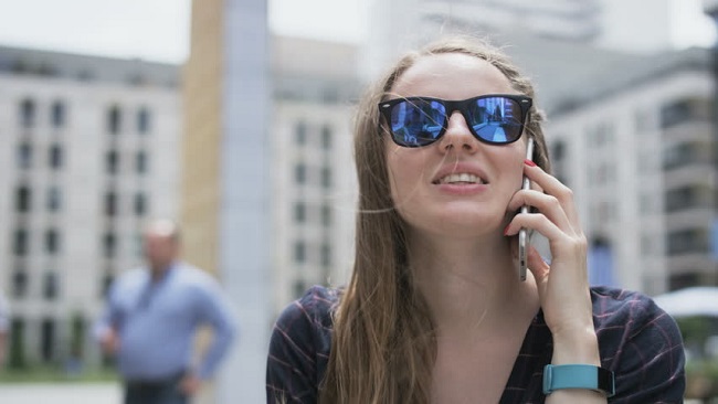 girl talking over cellphone 