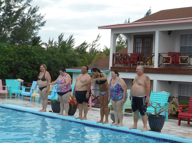 Overweight couple in the swimming pool