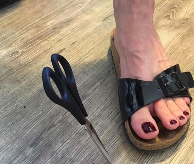 Scissors near foot