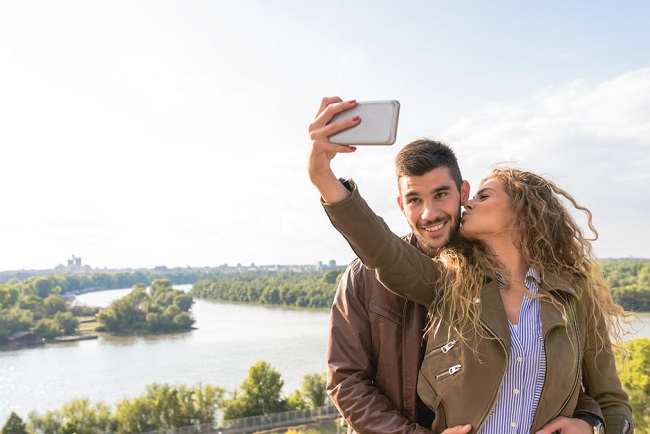 Taking selfie together.