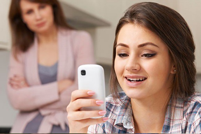 teenager chating over cellphone