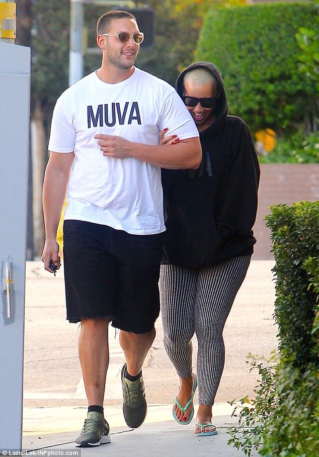 Amber Rose and her bodyguard often get touchy-feely