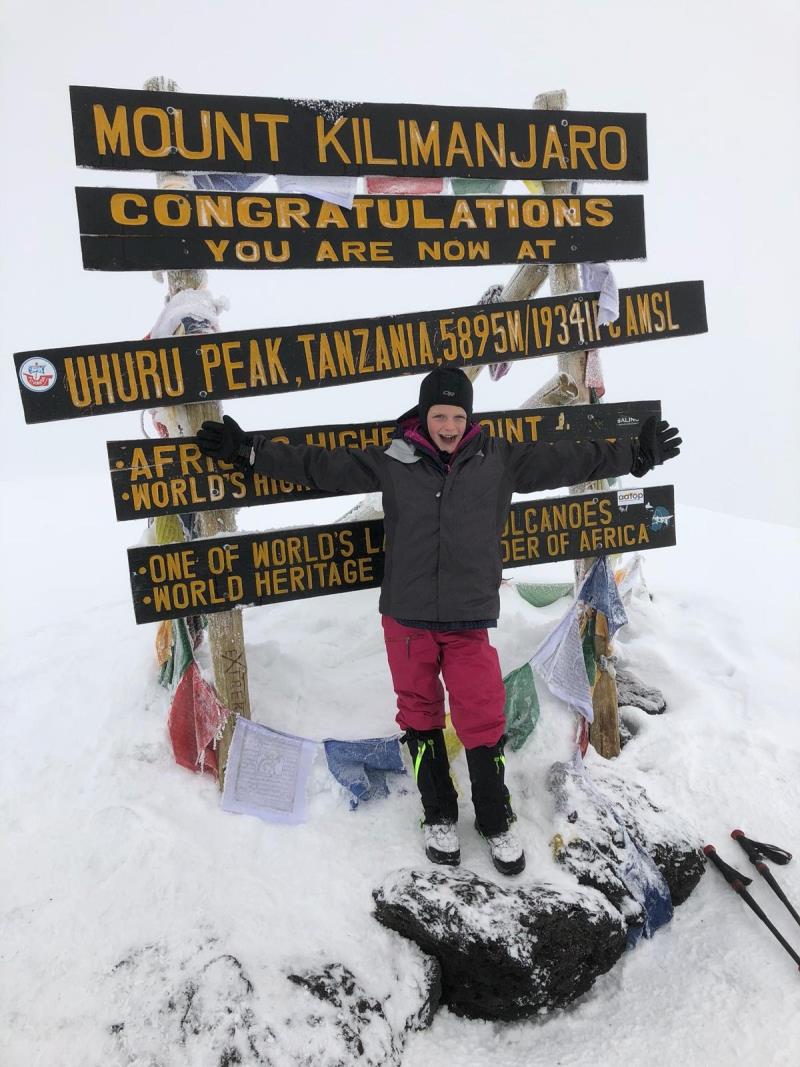 What inspires her to climb mountain Kilimanjaro?