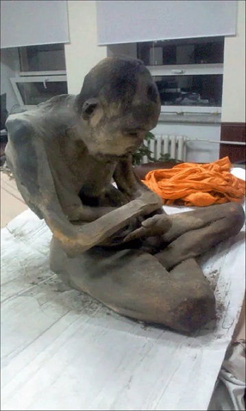 His mummified body was put inside the statue of Buddha